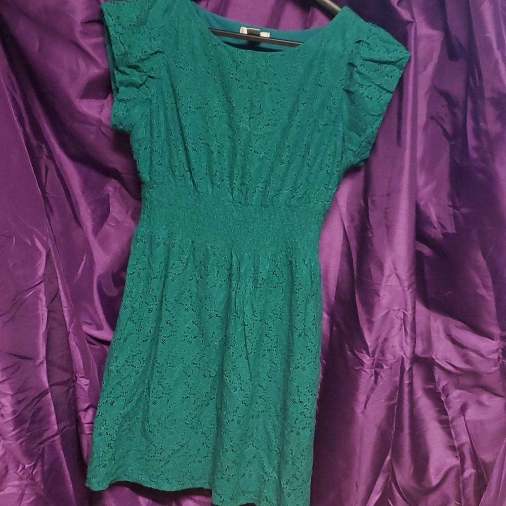 Short sleeved Aquamarine knee lenth lace dress.